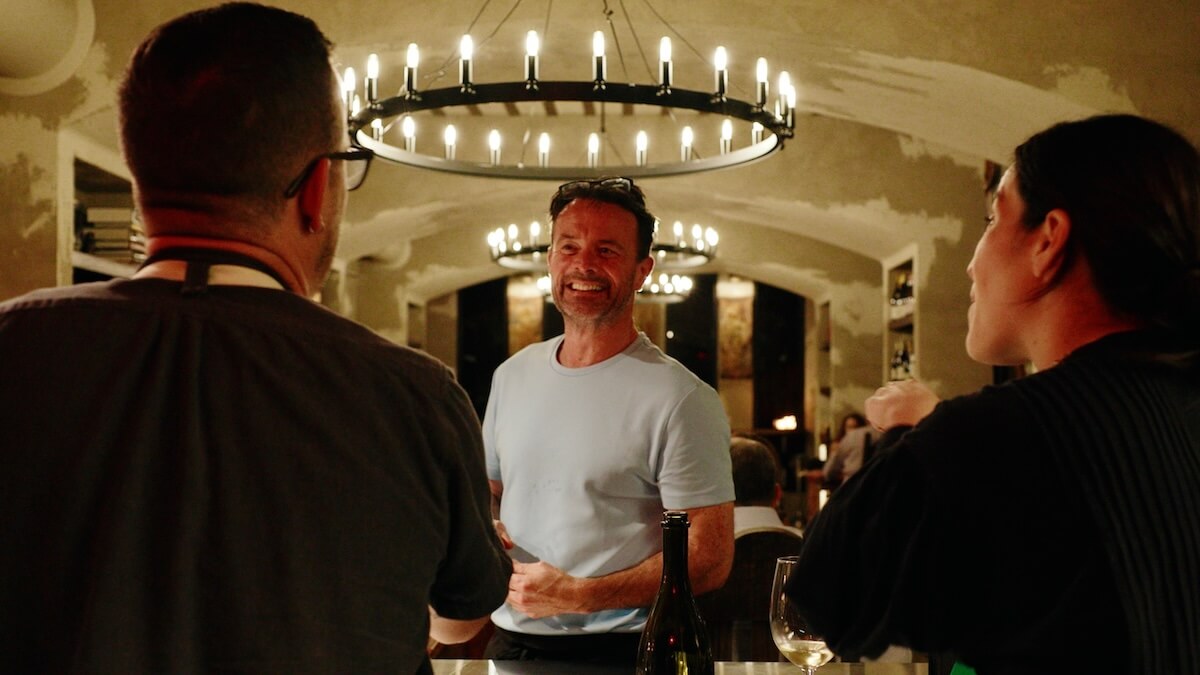 Chef Douglas Keane greets guests