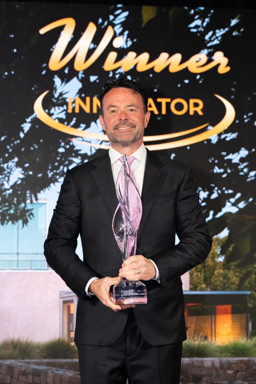 Chef Douglas Keane holding his Menu Masters Award in May of 2026